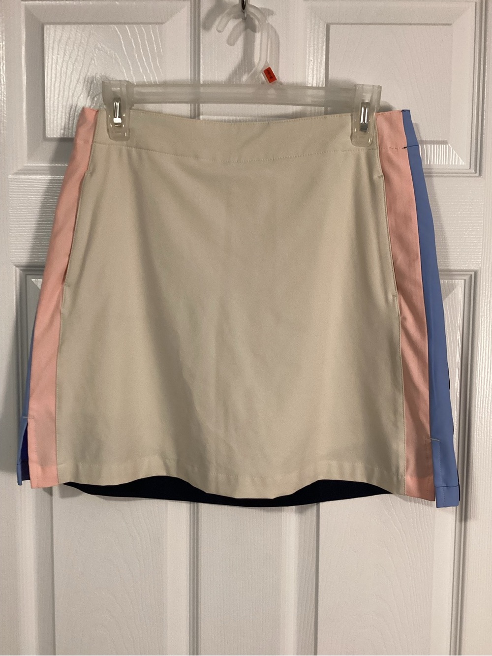 Lady Hagen Cream Golf Skirt with Navy Backside